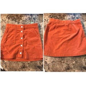Rust colored corduroy button down skirt